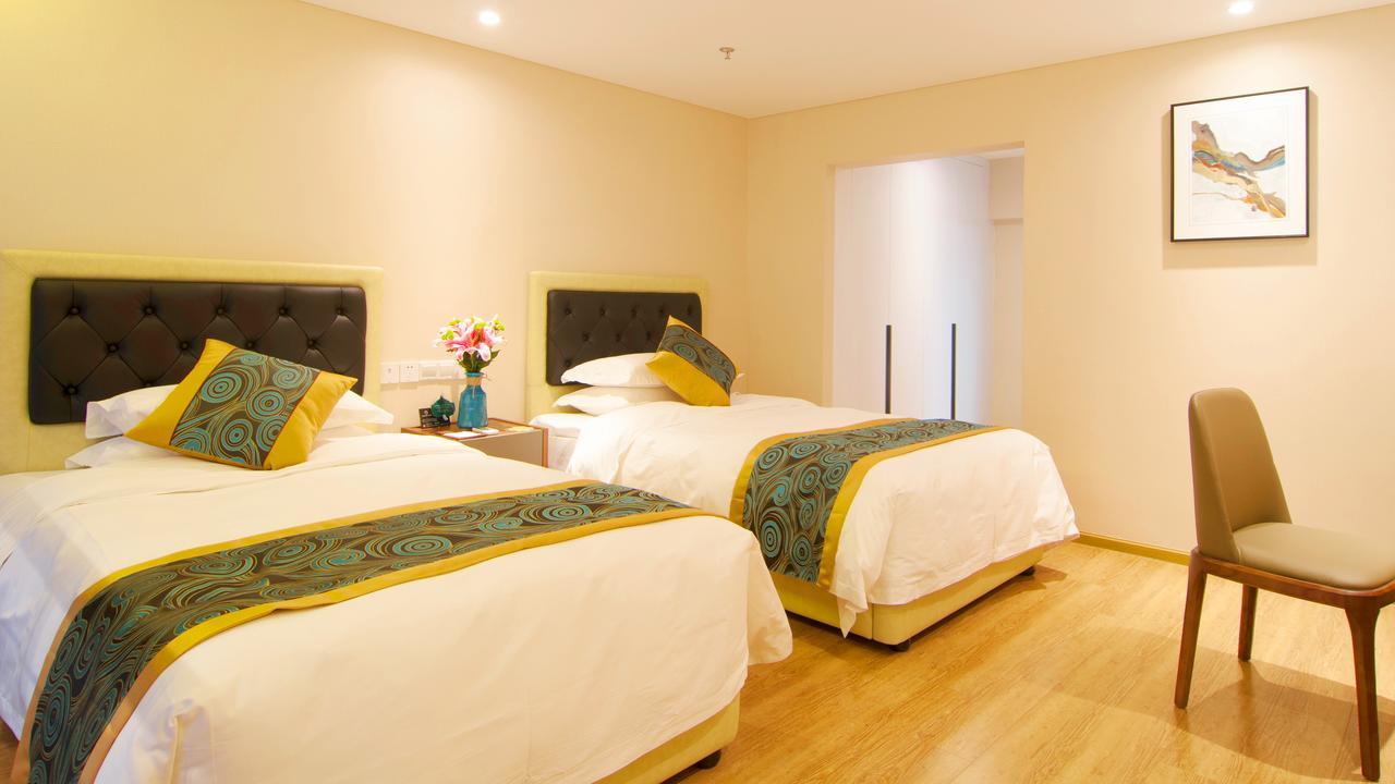 Home Plus Suite Hotel And Apartment Wuhan Exteriör bild